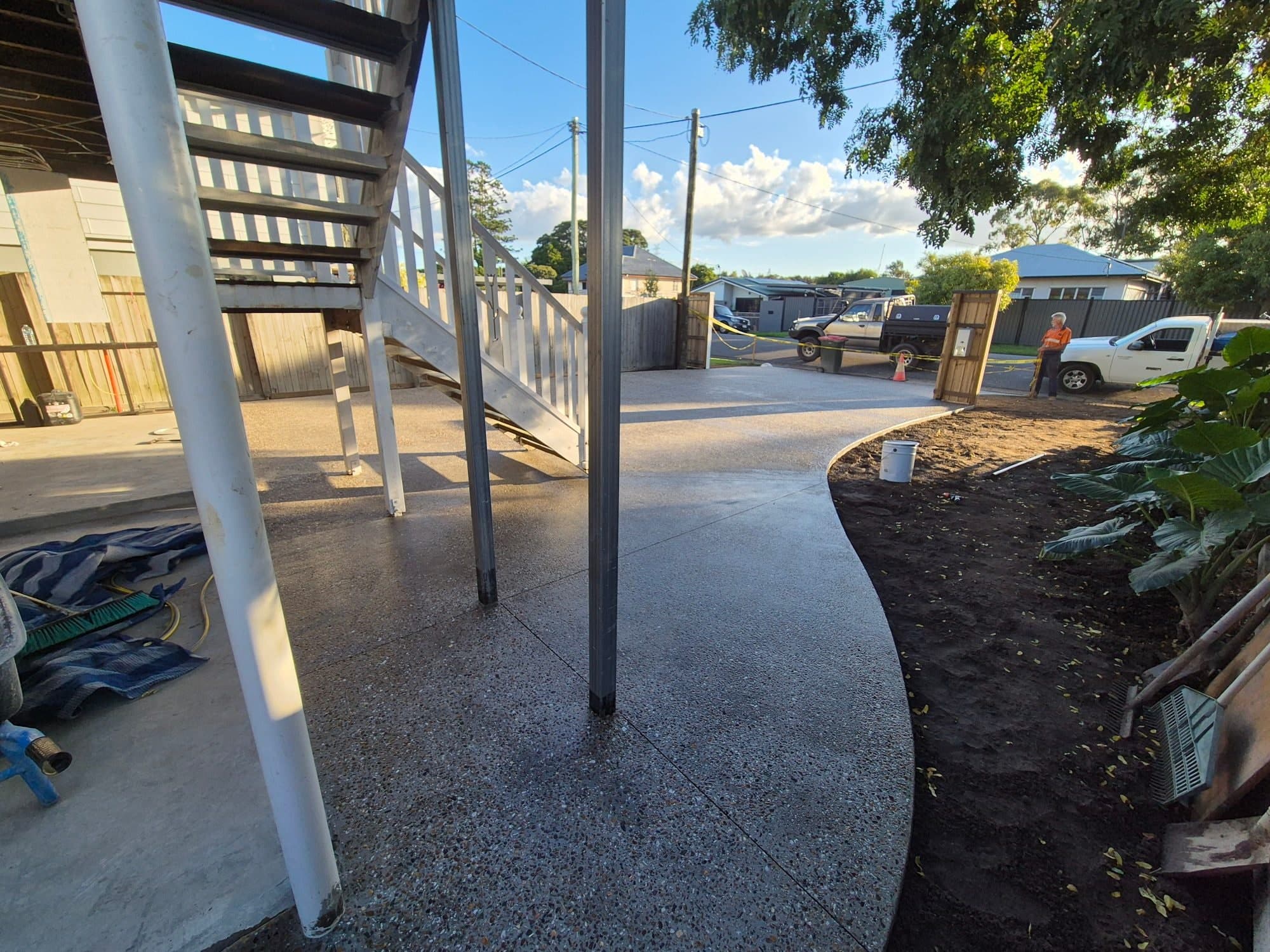 Fresh residential concrete driveway and access area at a Gympie home